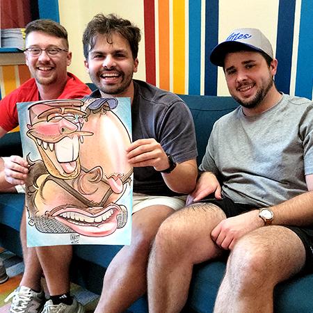 Two poeple smiling in front of the Chattanooga Choo Choo building